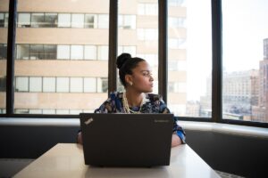 Female employee thinking in office