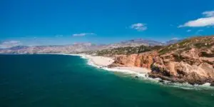 Scenic Aerial View of Coastal Cliffs and Sandy Beach